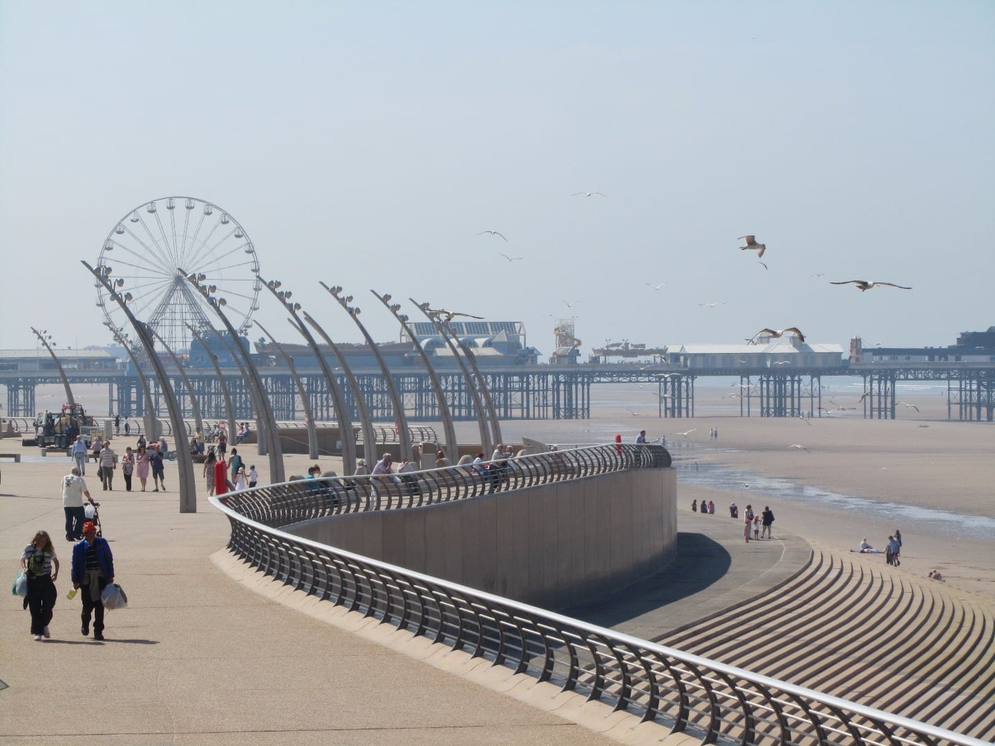 Blackpool seafront, looking towards Central Pier with North Pier behind you