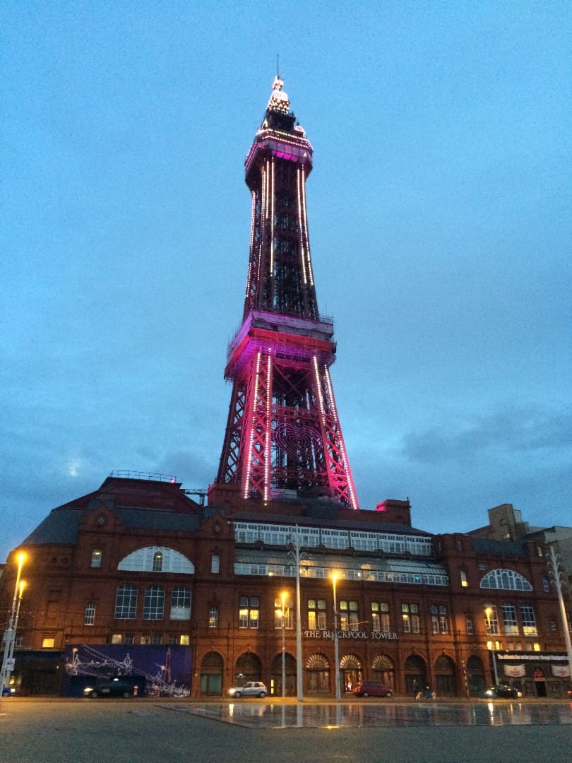Blackpool Tower, with the former Tower Lounge building boarded up on the bottom left corner