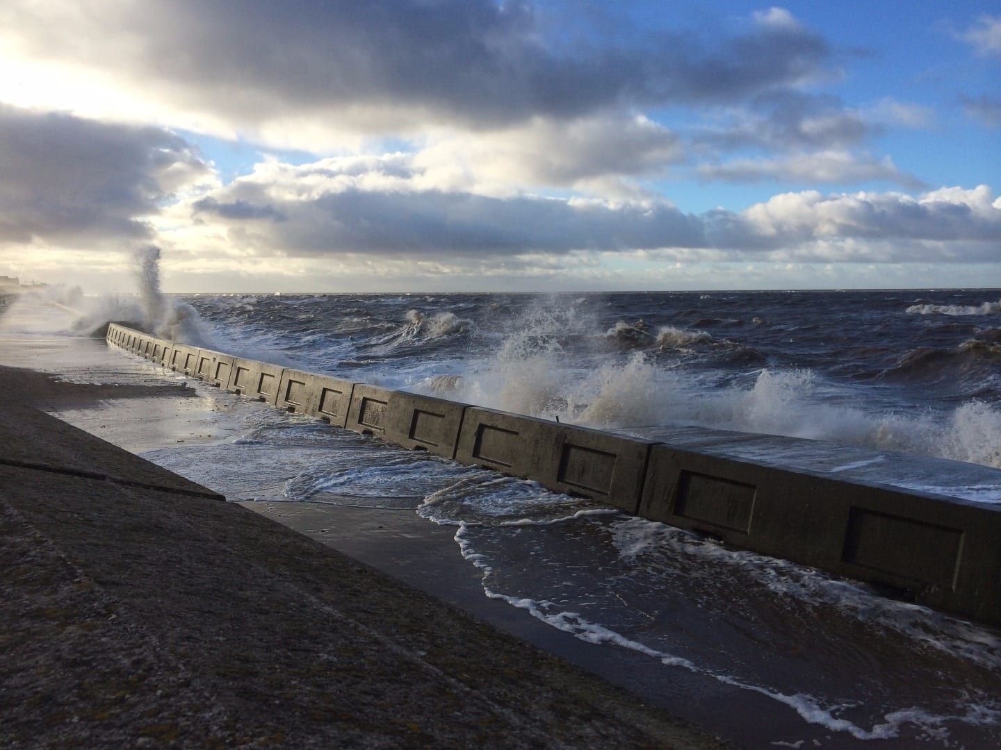Looking along the lower promenade of Blackpool seafront at Little Bispham
