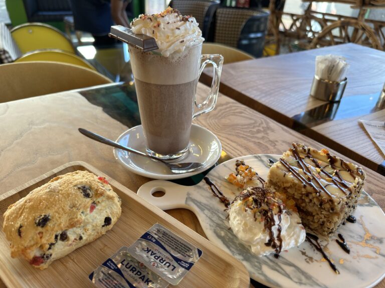 Scone, hot chocolate and cake